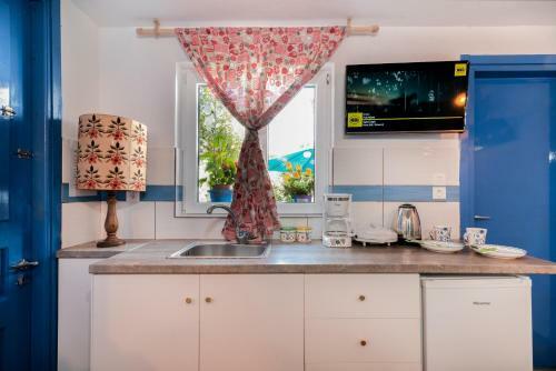 Apartamento 4 Seasons Suites Unlikely-garden