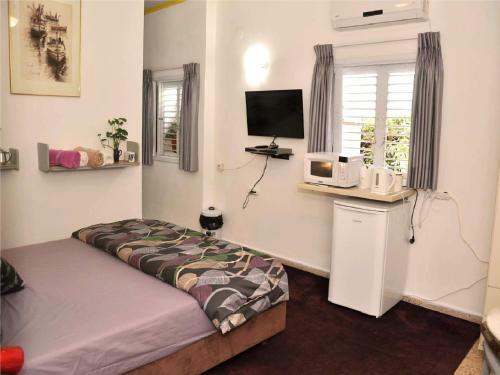 Hostal Tom's Place Giv?atayim