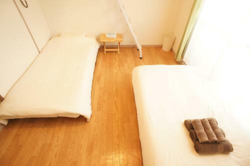 Apartamento Plusone Fujisaki