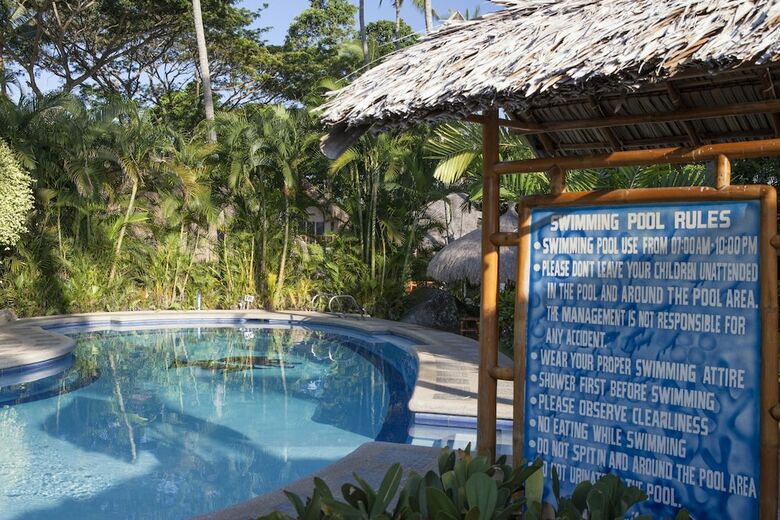 Apartamento Pura Vida Beach & Dive Resort
