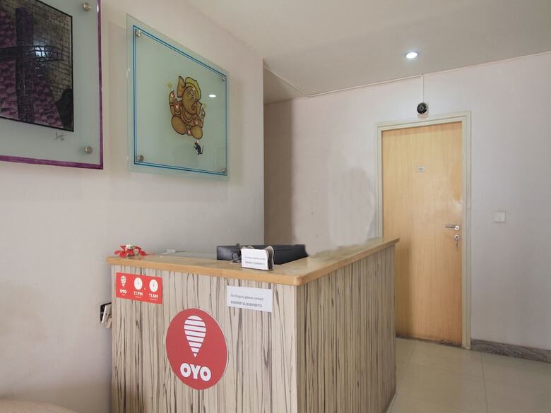 Oyo 11883 Hotel Purple Inn