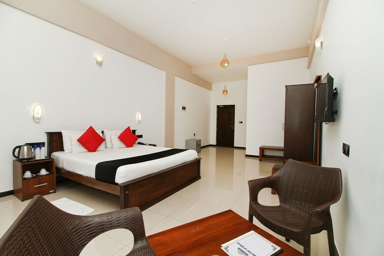 Hotel Capital O 311 Grace Beach Resort