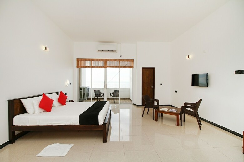 Hotel Capital O 311 Grace Beach Resort