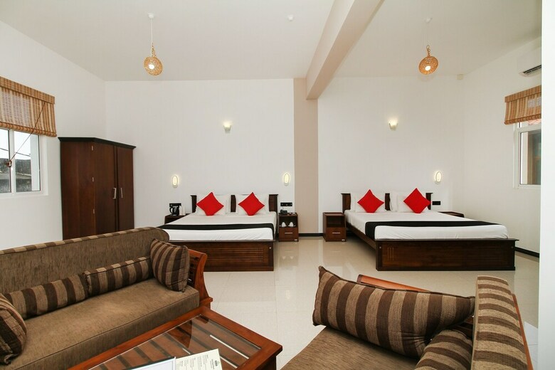 Hotel Capital O 311 Grace Beach Resort
