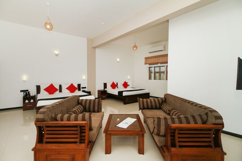 Hotel Capital O 311 Grace Beach Resort