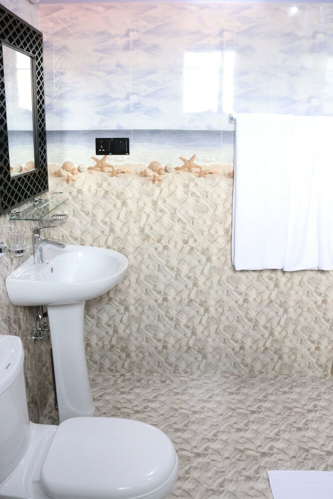 Hotel Capital O 311 Grace Beach Resort