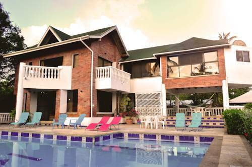 Hostal Casa De Las Flores Tropical Lodge