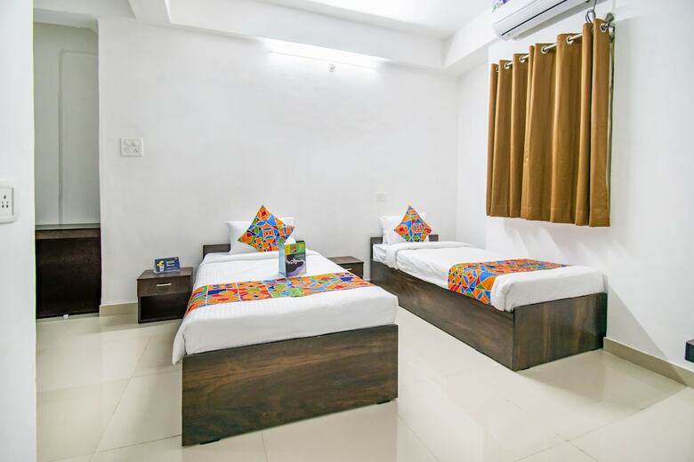 Fabhotel Purple Orchid