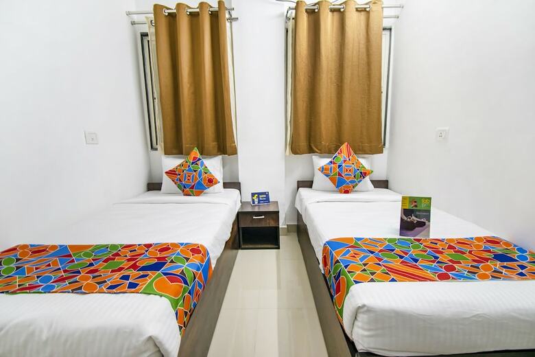 Fabhotel Purple Orchid