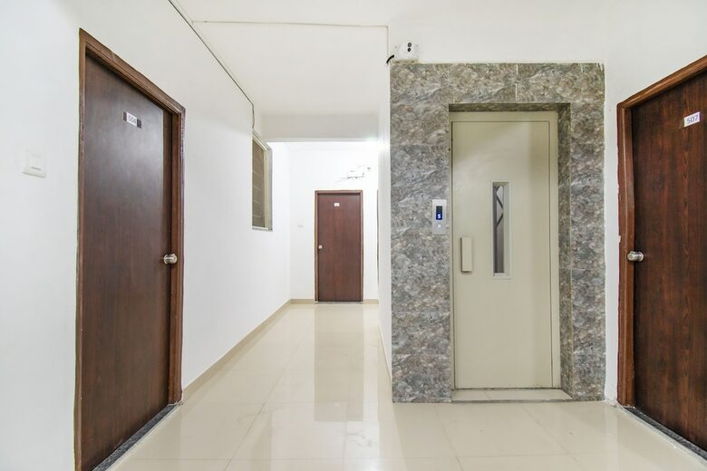 Fabhotel Purple Orchid