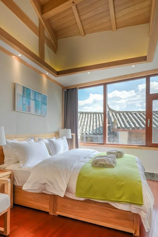Posada Floral Hotel Lijiang Huazizai