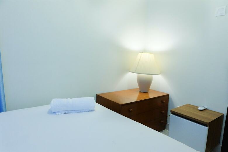 Homey And Modern 2br Puri Mansion Apartment