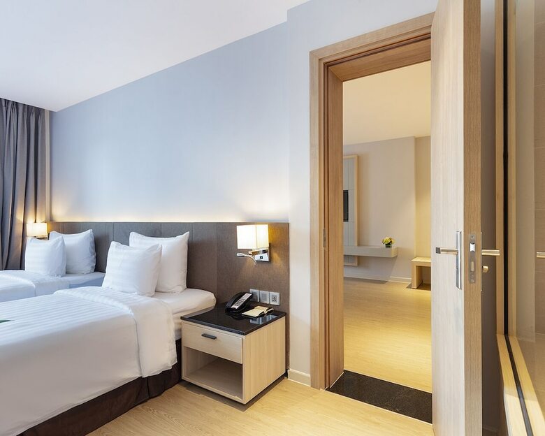 Dqua Hotel And Apartment