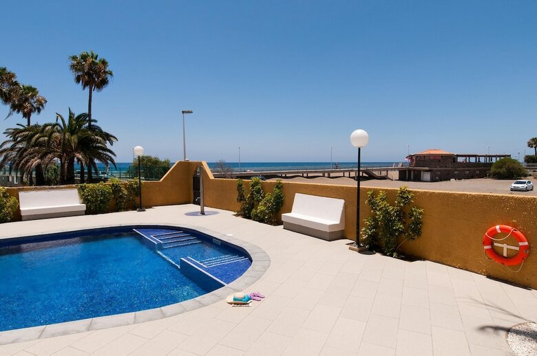 Beach Front Apartment In Playa de Las Burras Cn