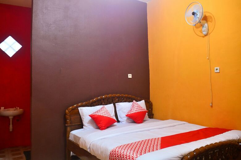 Hostal Oyo 1145 Rita Guesthouse