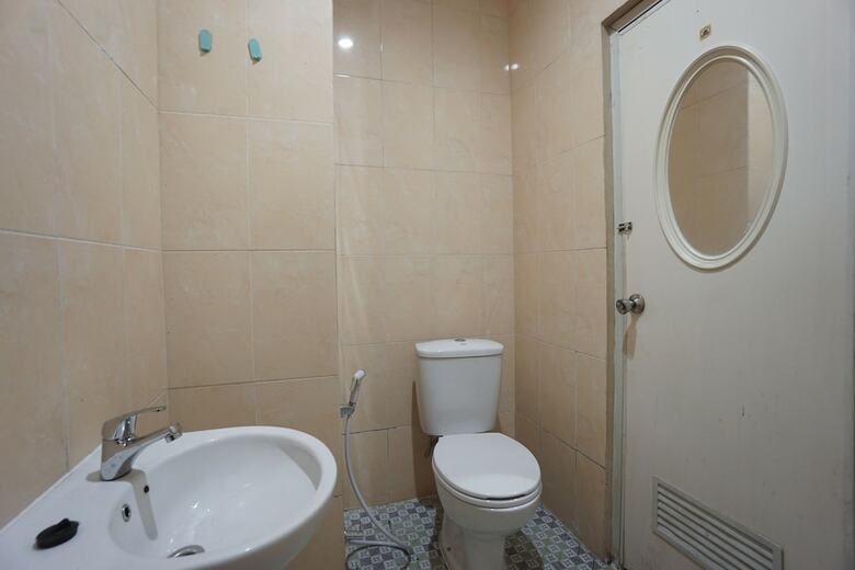 Hostal Oyo 2566 Putri Kesia Rooms