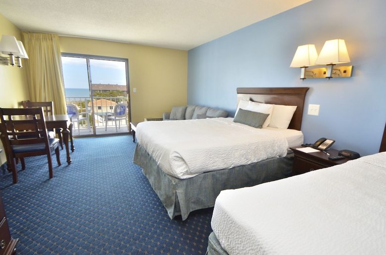 Apartamento Coastal Palms Inn & Suites