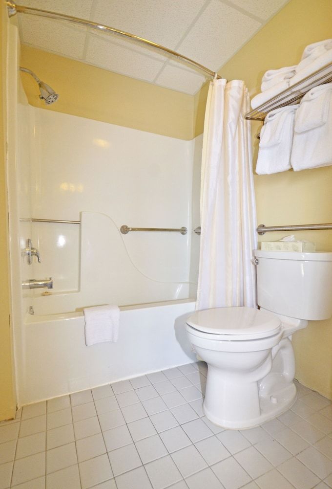 Apartamento Coastal Palms Inn & Suites