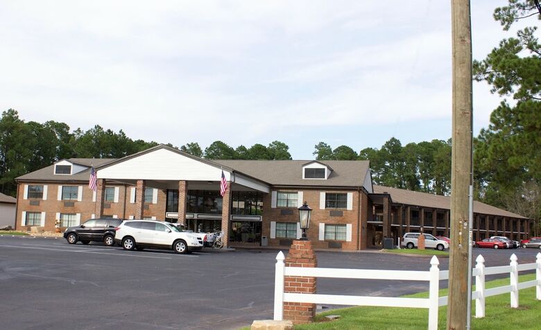 Hotel At Home Inn & Suites