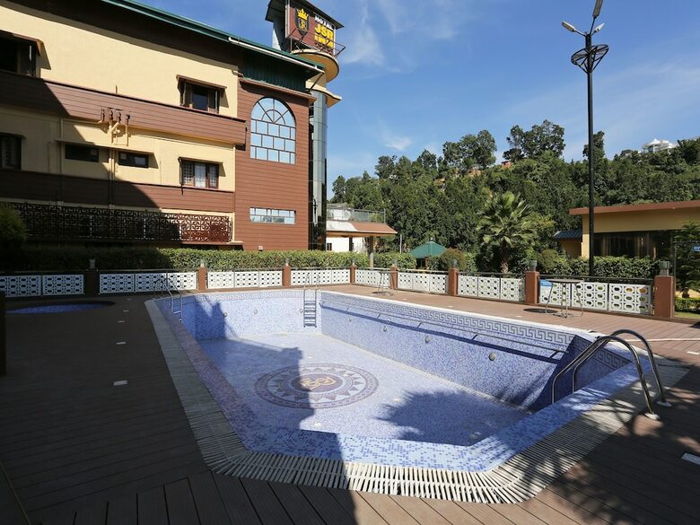 Capital O 23238 Hotel Jsr Inn
