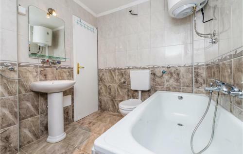Four-bedroom Holiday Home In Igalo