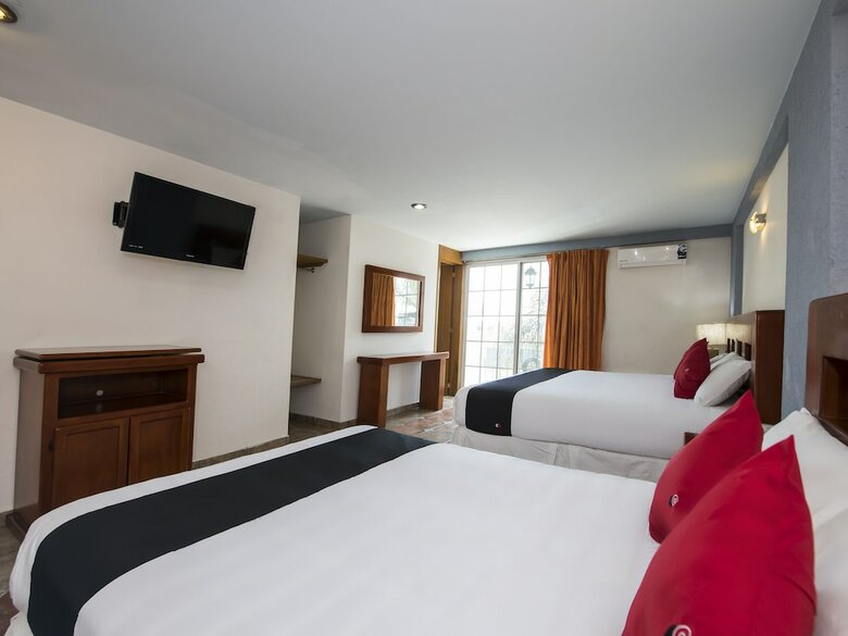 Hotel Capital O Suites de Reyes