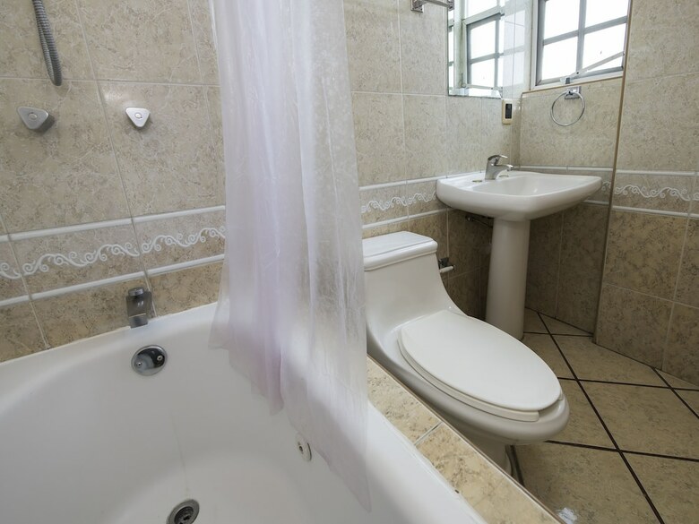 Hotel Capital O Suites de Reyes