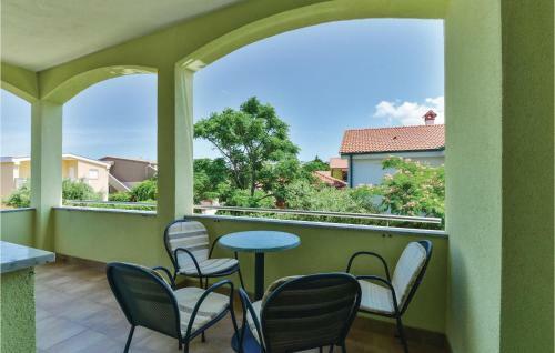 Two-bedroom Apartment In Povljana