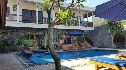 Coral Beach Pizza Cottages