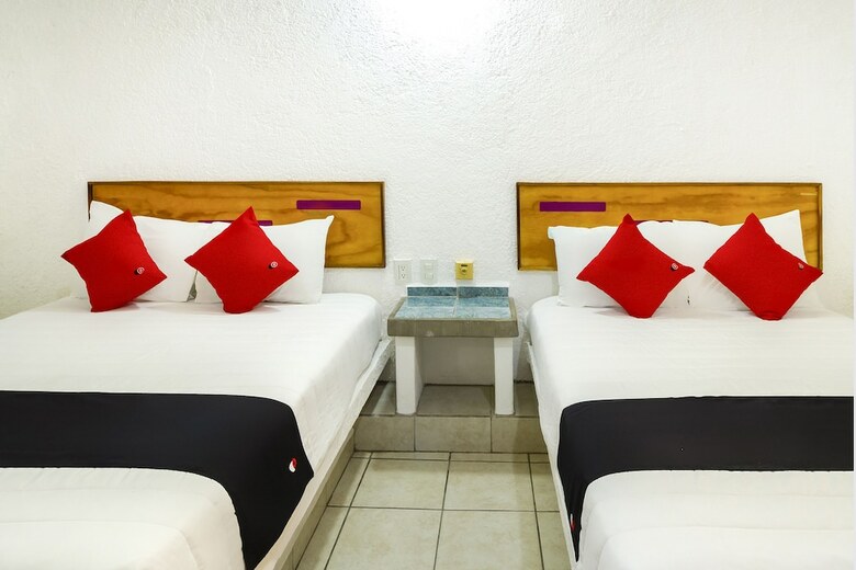 Capital O Hotel Parotas