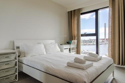 Apartamento 2bd Apt W Stunning Views In High Rise - Docklands