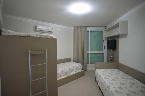 Apartamento L098 - Residencial Athenas 204