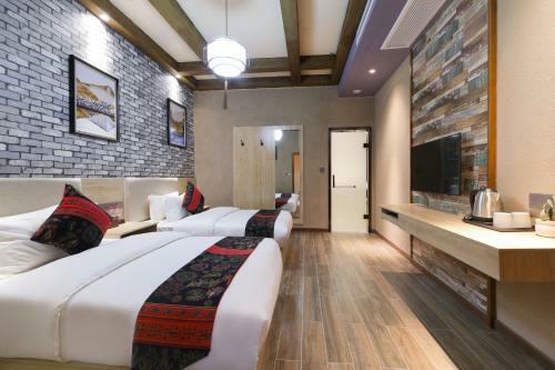 Zou Qu Ye Travel Hotel