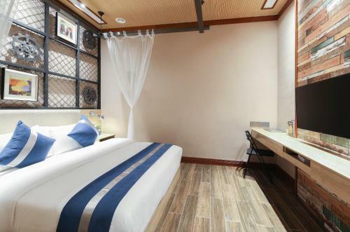 Zou Qu Ye Travel Hotel