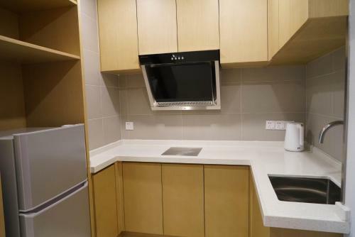 Hotel Donghua Apartment
