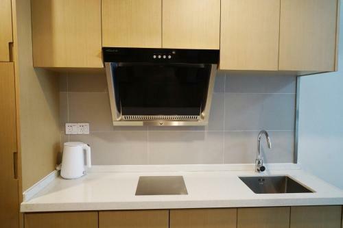 Hotel Donghua Apartment
