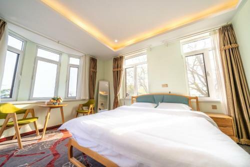 Qingdao Top Yunyin Homestay