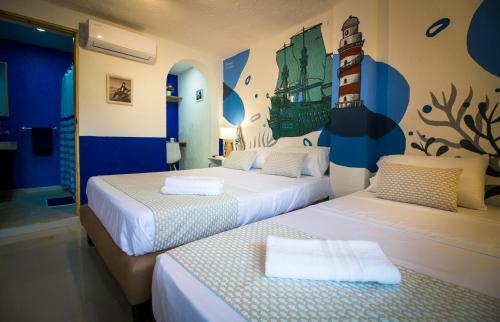 Casa Del Puerto Hostel & Suites