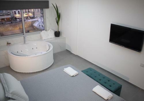 Apartamento Purple Orange Luxury Suites