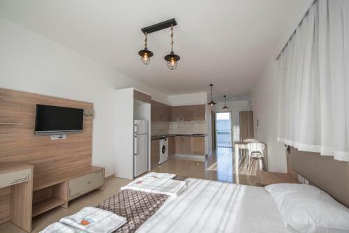Apartamento Deniz Airport Suites