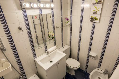 Apartamento Homeholidaysrentals Regard