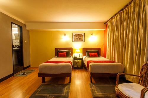 Hotel Ambassador Garden Home