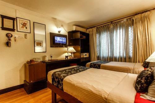 Hotel Ambassador Garden Home