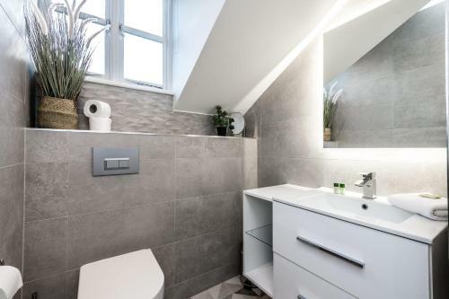 Charming 3-bedroom Coach House With Free Attached Garage!