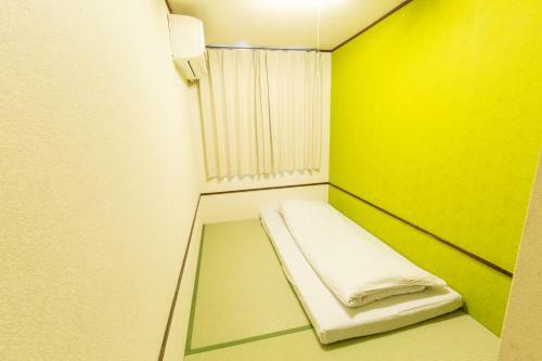 Albergue Backpackers Hotel Toyo