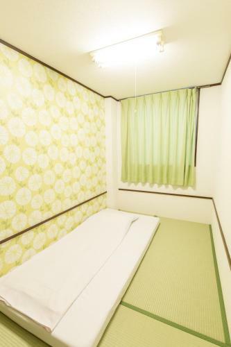 Albergue Backpackers Hotel Toyo