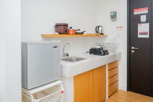 Relax And Comfy @ Studio Casa de Parco Apartment By Travelio