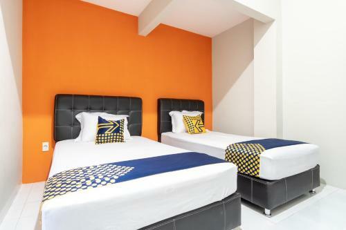 Hotel Spot On 2272 Citra Arcade Residence Syariah