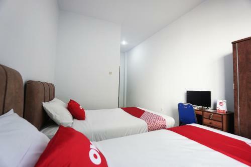 Hotel Oyo 2566 Putri Kesia Rooms