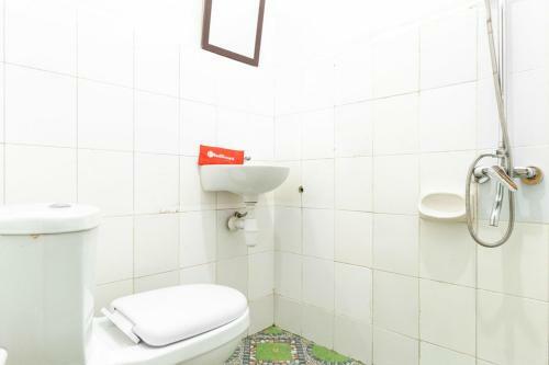 Hostal Reddoorz Plus Near Universitas Methodist Medan
